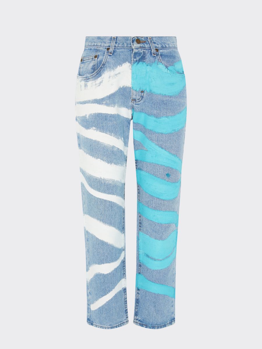 Send us your worn-out jeans and we’ll repair and upcycled them to give them a second chance in your wardrobe. We can embroider any pattern, any writing, or even paint artwork directly onto the jeans to create a style that is completely unique to you. Produced by Fanfare Label, a contemporary sustainable womenswear brand.