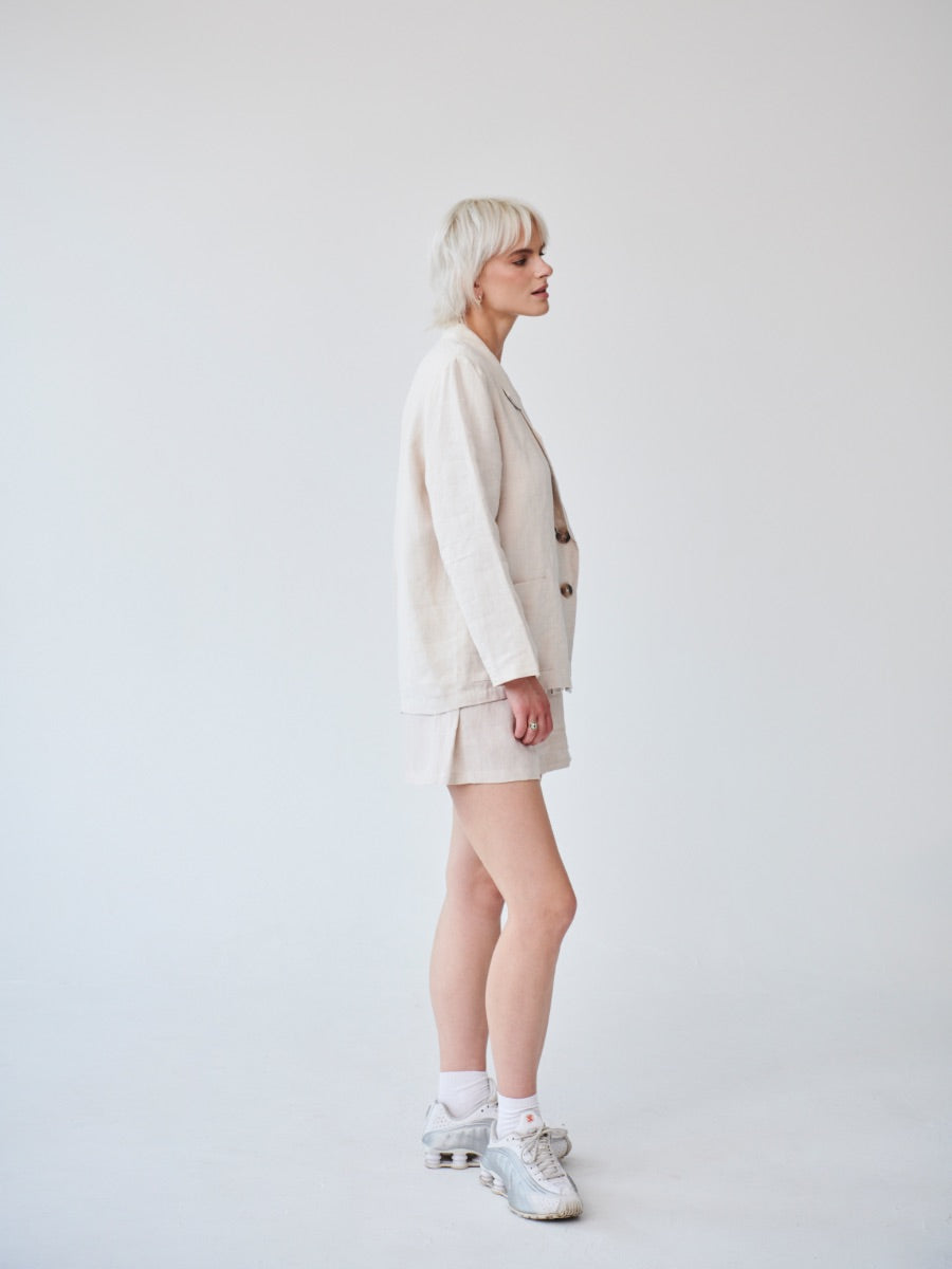 Double breasted Ethically Made Beige Linen Suit with shorts and a high waist. Made by ethical clothing brand Fanfare Label