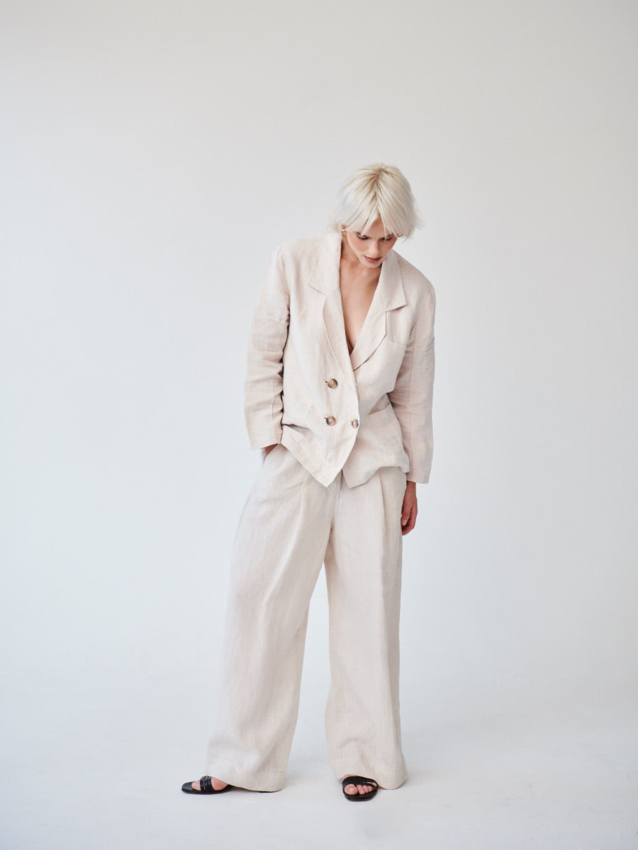 Ethically Made Double Breasted Beige Linen Suit with Wide Leg Trouser. Sustainable clothing brand Fanfare Label