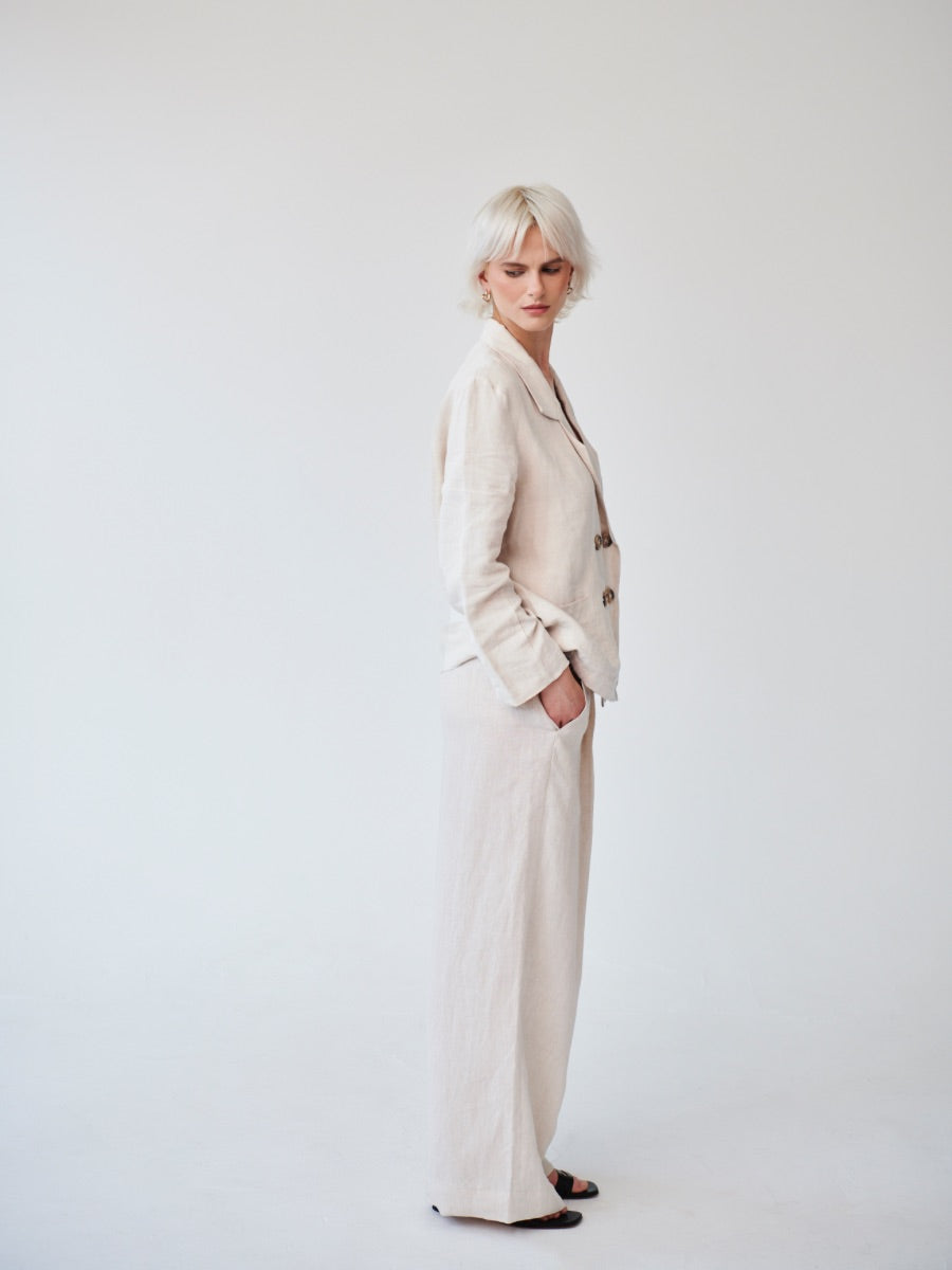 Ethically Made Double Breasted Beige Linen Suit with Wide Leg Trouser. Sustainable clothing brand Fanfare Label