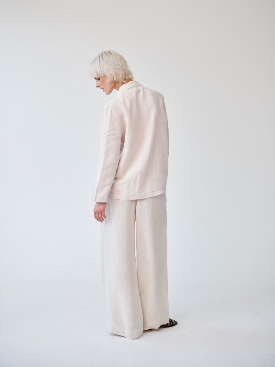 Ethically Made Double Breasted Beige Linen Suit with Wide Leg Trouser. Sustainable clothing brand Fanfare Label