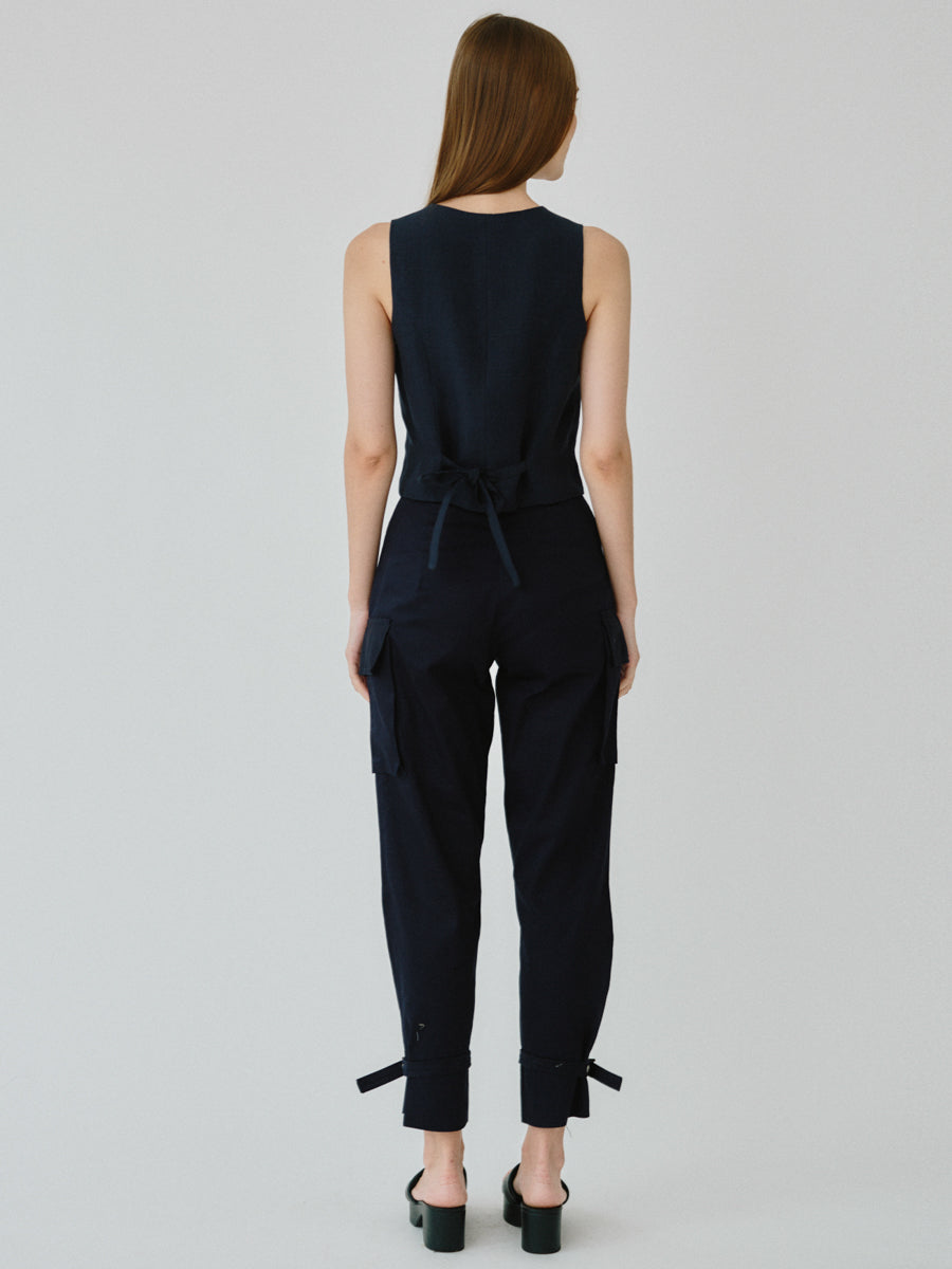 Organic Cotton Navy Utility Cargo Pant with two side pockets & buckles on the ankles. Sustainably made in the UK by ethical clothing brand Fanfare Label