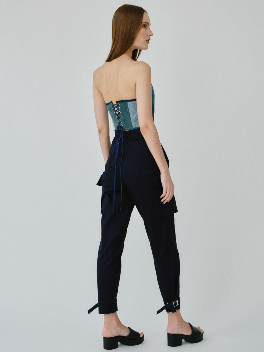 Organic Cotton Navy Utility Cargo Pant with two side pockets & buckles on the ankles. Sustainably made in the UK by ethical clothing brand Fanfare Label