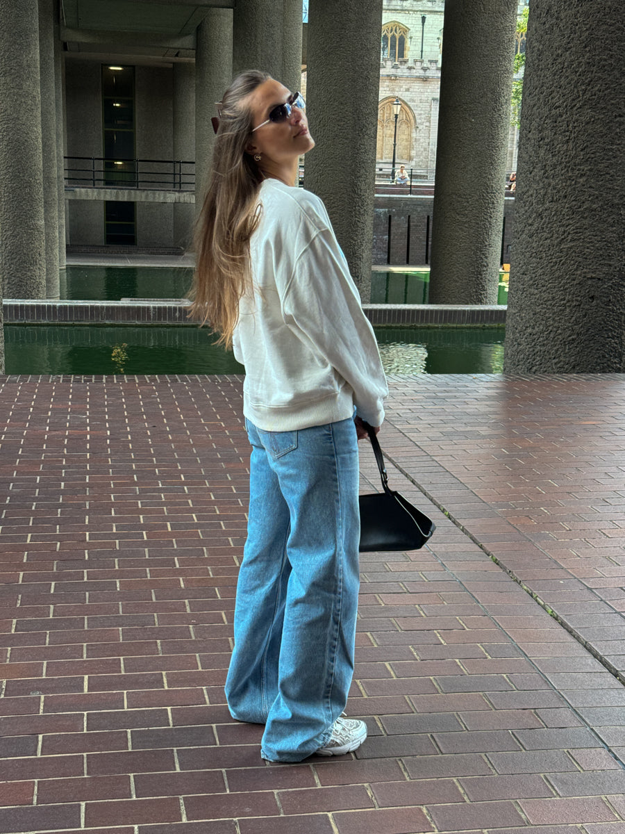 White Jumper With Blue Stripe