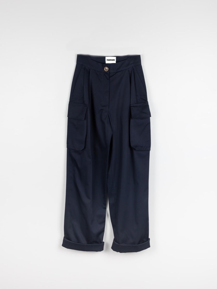 Organic Cotton Navy Utility Cargo Pant with two side pockets & buckles on the ankles. Sustainably made in the UK by ethical clothing brand Fanfare Label