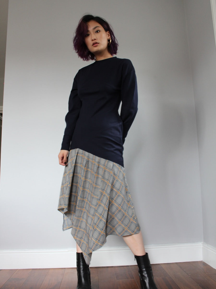 Asymmetric Check Dress, Navy with a navy & yellow check fluid skirt. Made in the UK by sustainable & ethical clothing brand Fanfare.