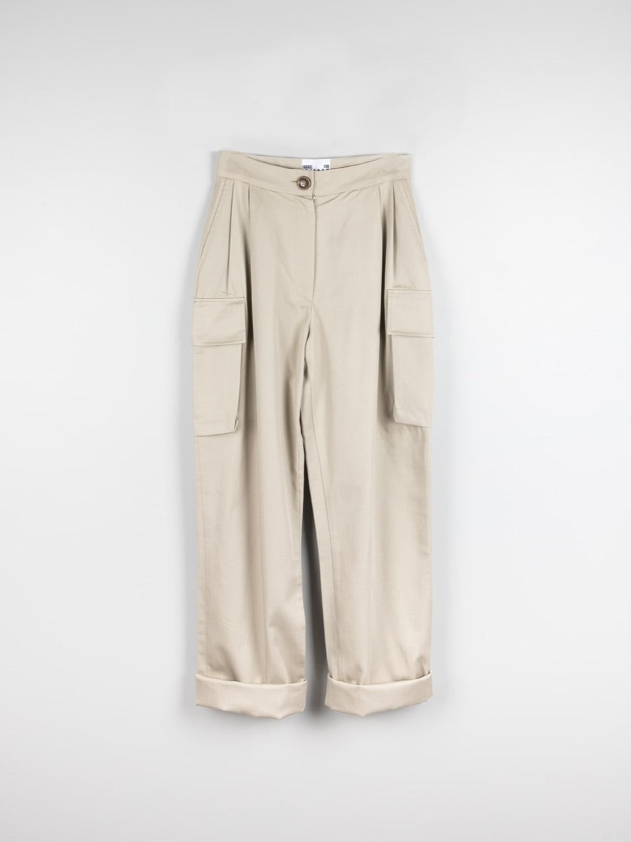 Organic Cotton Beige Utility Cargo Pant with two side pockets & buckles on the ankles. Sustainably made in the UK by ethical clothing brand Fanfare Label