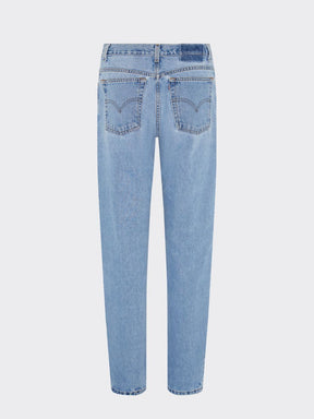 Fanfare Label sustainable women’s clothing brand UK. Our upcycled jeans are high-waisted, blue denim and made from recycled denim. We decorate every jean with a full patchwork design made from recycled materials.