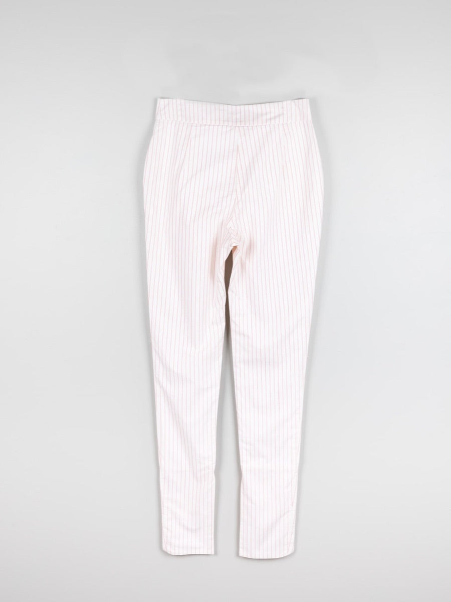 100% Organic Cotton Red & White Stripe Skinny Trousers with a cutaway ankle cuff. Created by Fanfare Label, contemporary sustainable womenswear brand.