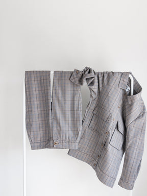 Check oversized shirt suit jacket with larger pockets on the front,  made from cotton. Designed & made in the UK by sustainable clothing brand Fanfare Label